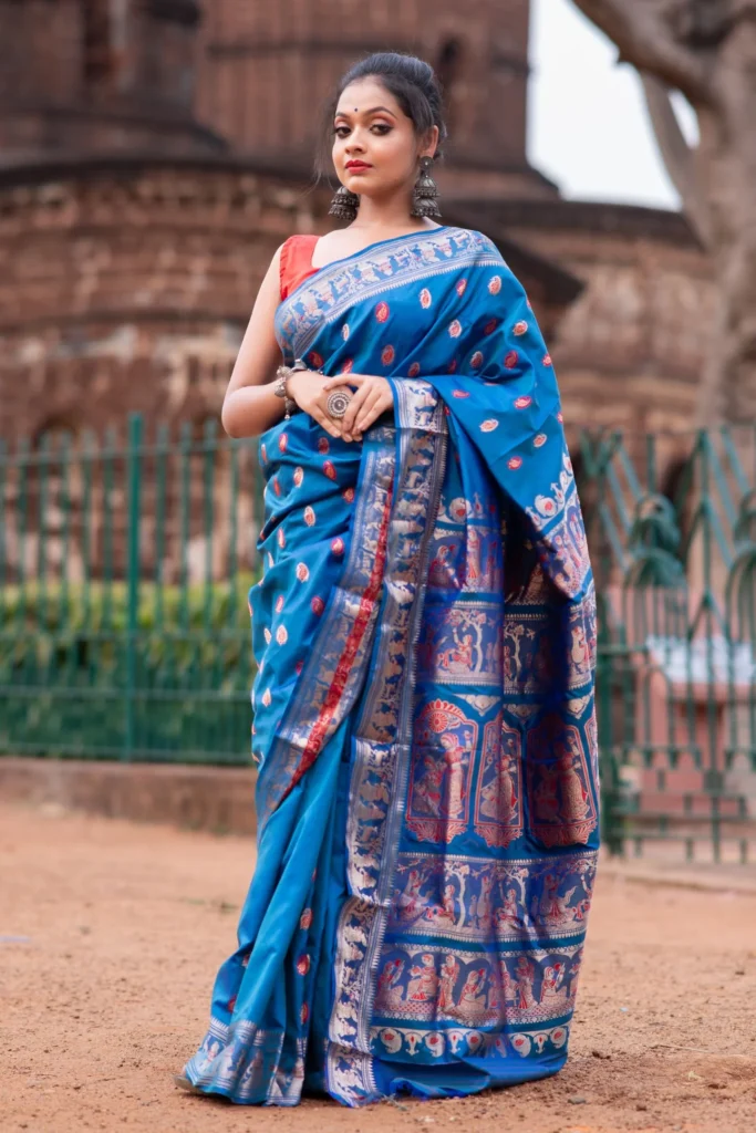 The Rich Weaving Traditions of West Bengal: Baluchari and Tant Sarees puresilkbluebalucharisareewithmythologicalfiguresandbutiwork 52